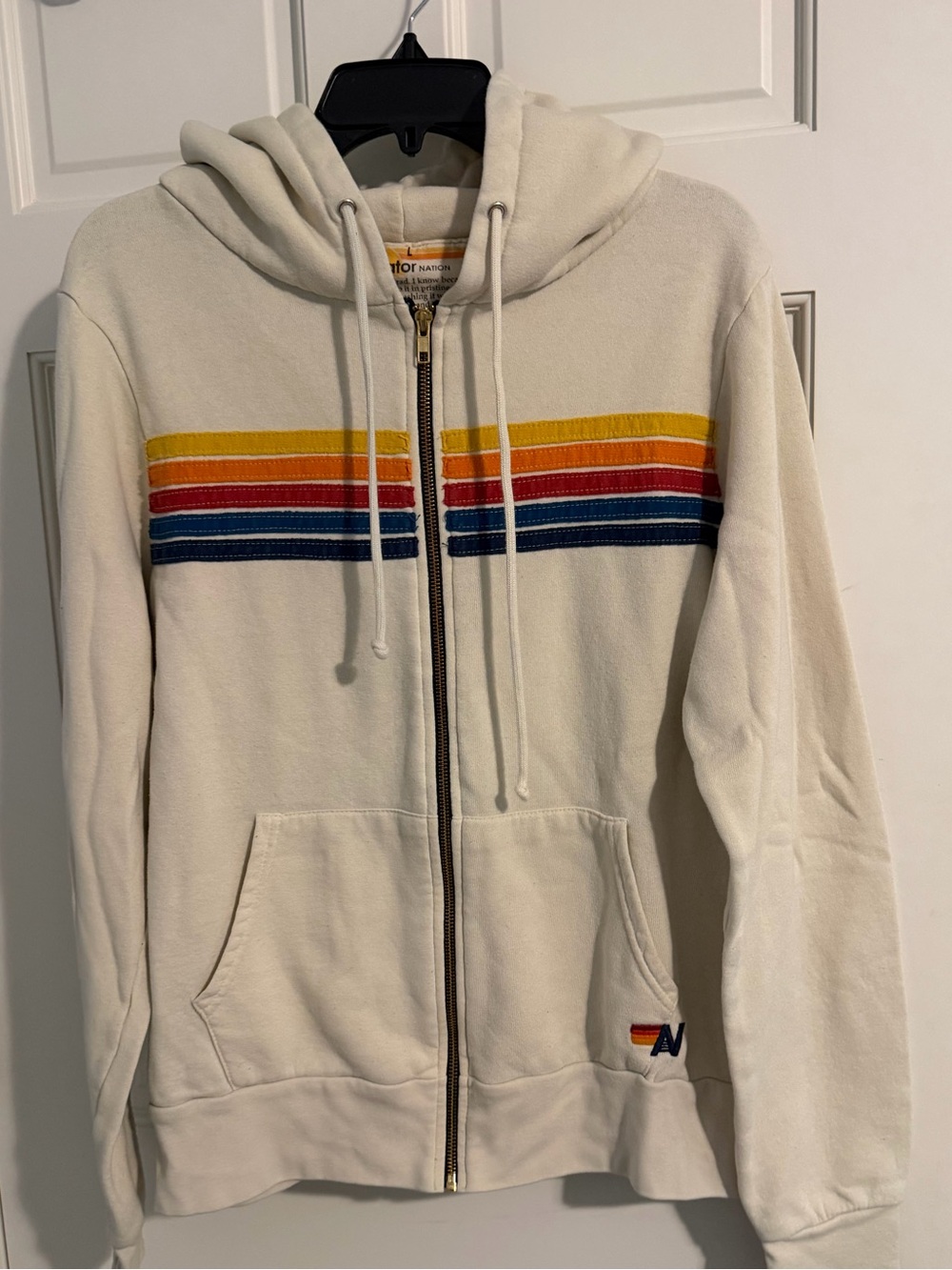Retro Stripe Cream Zip-Up Hoodie with rainbow stripes